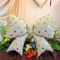 SS MILKY WHITE BOW WITH GOLD HEART PRINT FOIL BALLOONS HELIUM Filled